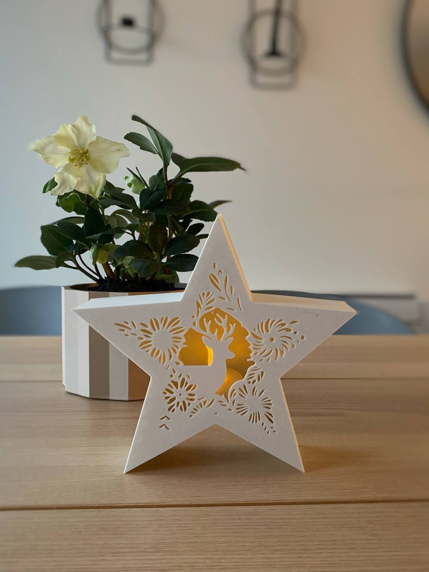 Julestjerne med reinsdyrmotiv